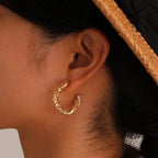14k Dainty Textured Spiral Hoop Earrings — product detail