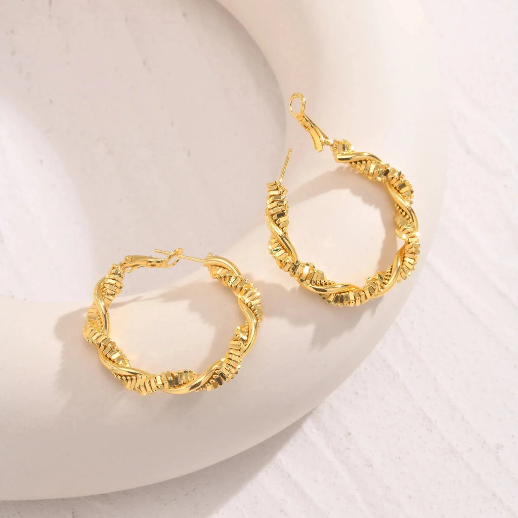 14k Deluxe Textured Spiral Hoop Earrings — product detail