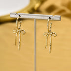 Dainty Dangle Bow Earrings — product detail