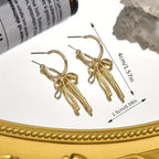 Dainty Dangle Bow Earrings — product detail