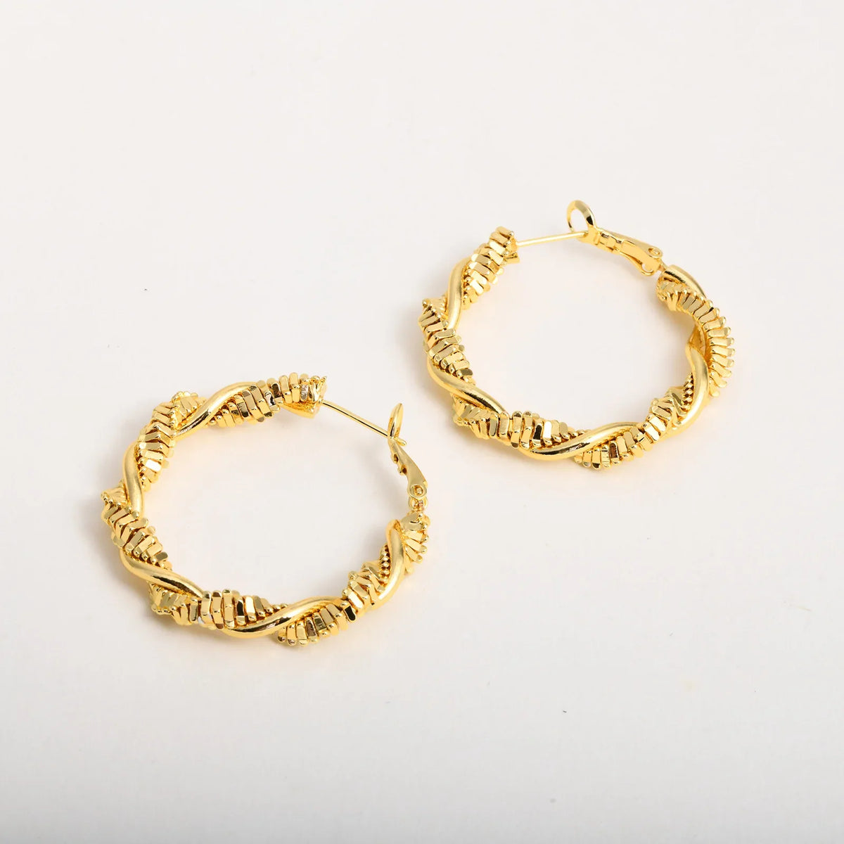 14k Deluxe Textured Spiral Hoop Earrings — product detail