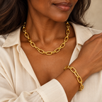 Gold paperclip necklace and bracelet set on model