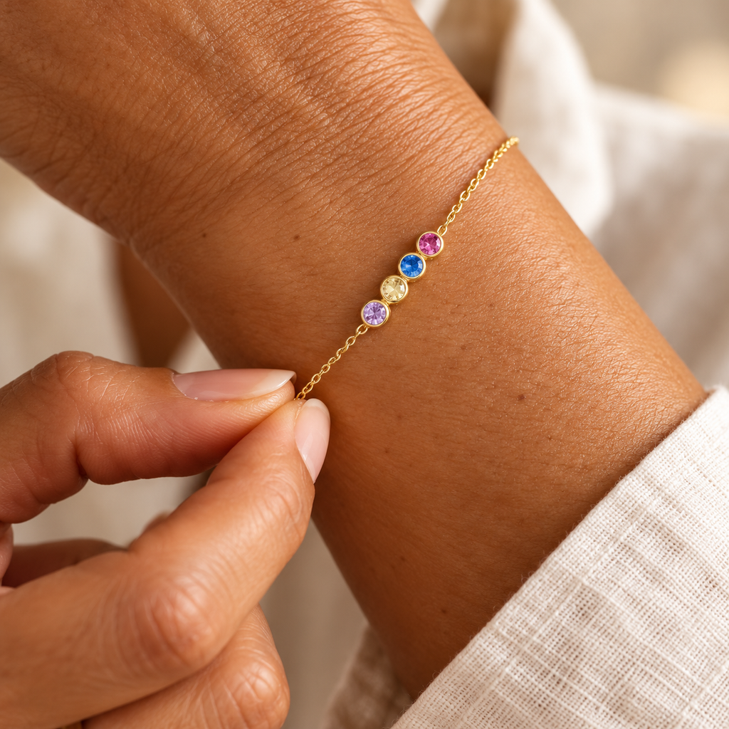 Four-colour birthstone chain bracelet on wrist