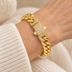 Gold Cuban bracelet with zircon clasp on wrist