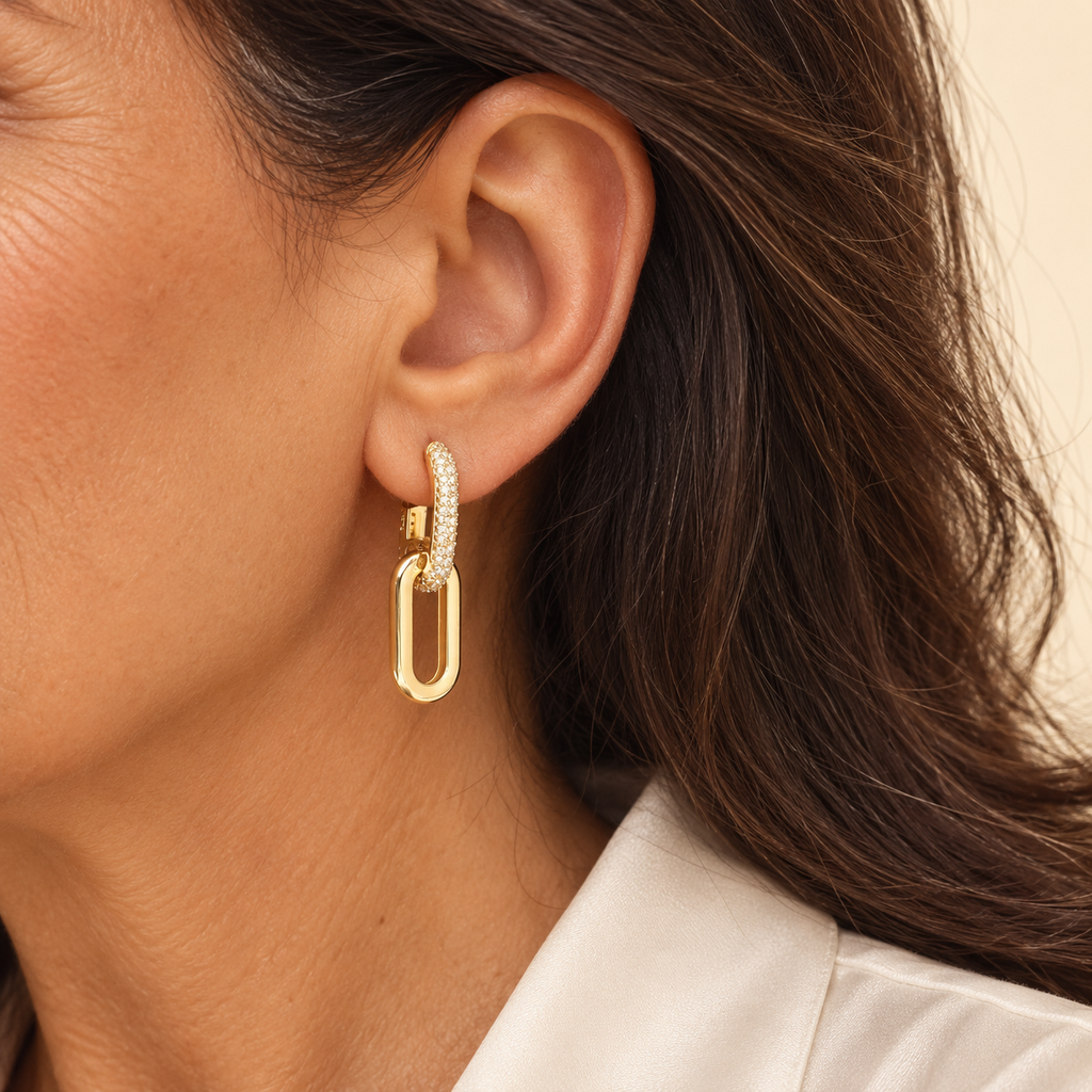 Gold pavé loop and paperclip drop earrings on model