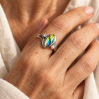 Evelise vintage iridescent mood ring on a hand