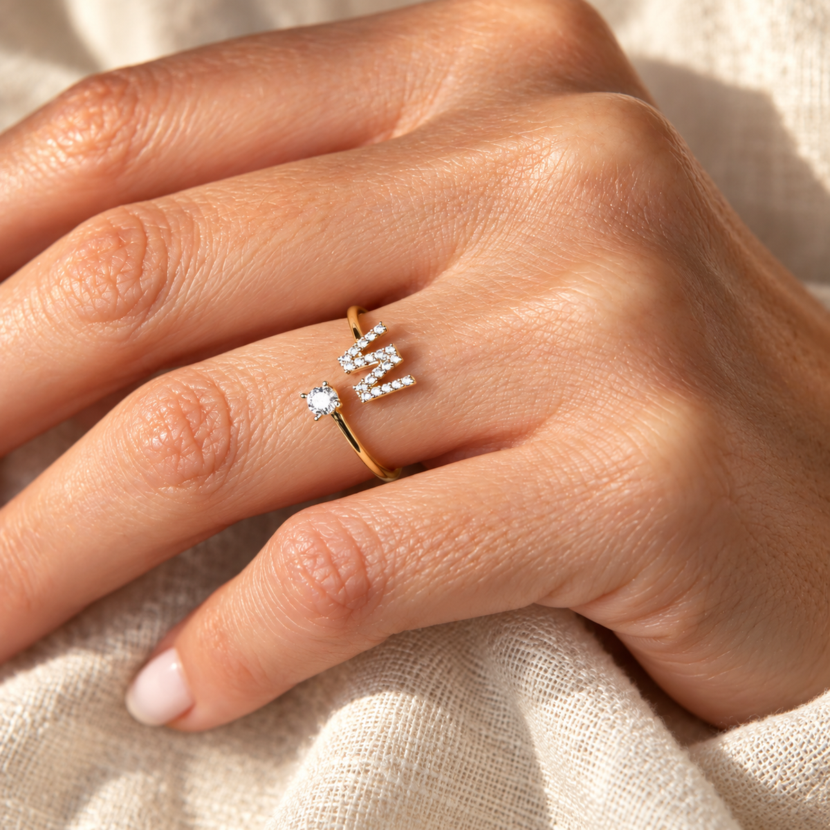 Evelise adjustable zircon initial ring on a hand