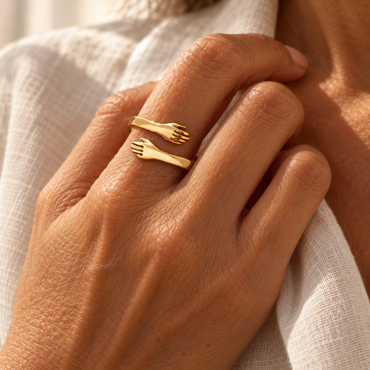 Evelise love warm embrace hug ring on a hand