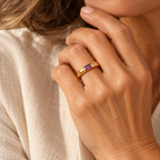 Evelise baguette birthstone ring on a hand